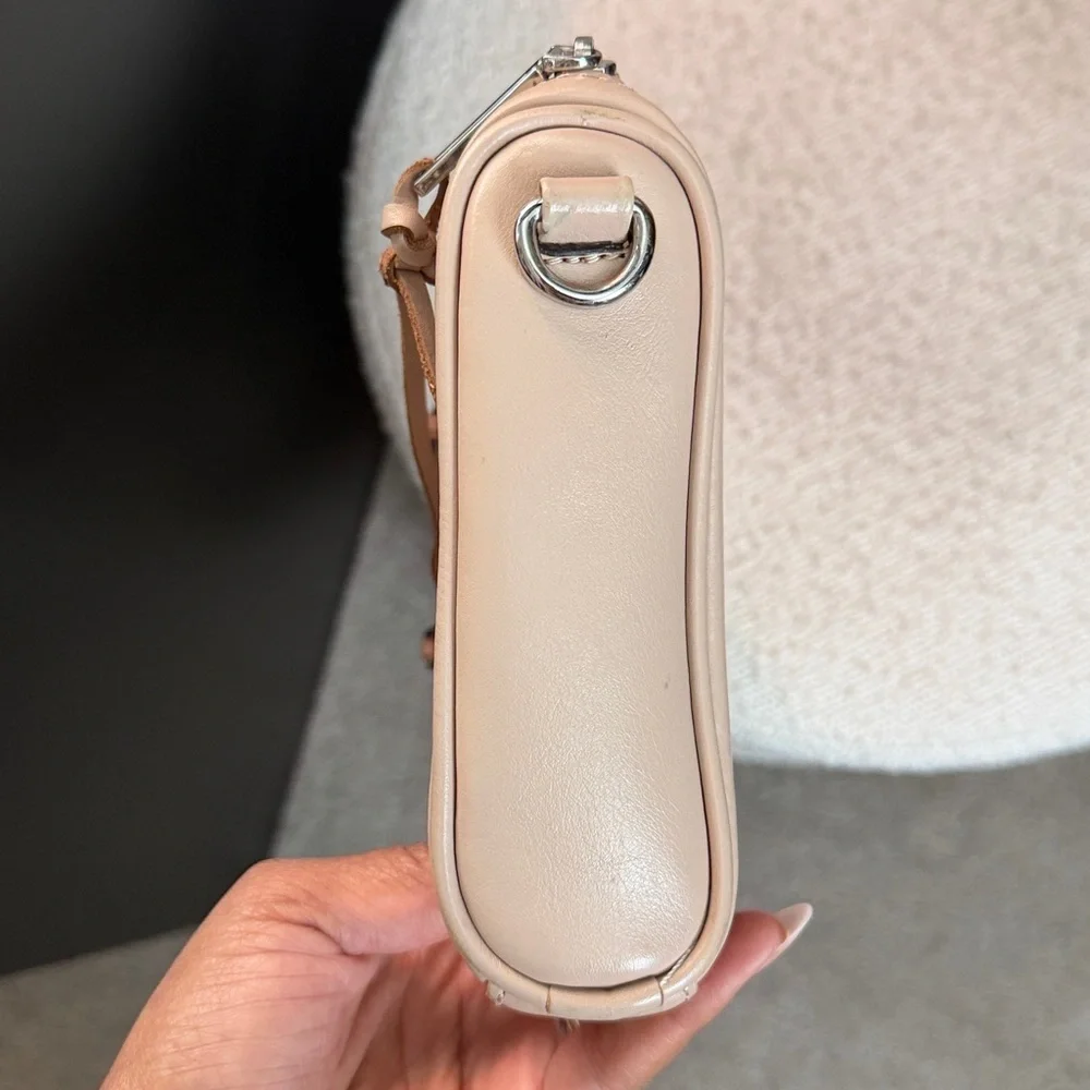 Rebecca Minkoff leather zip tassel crossbody nude cream silver